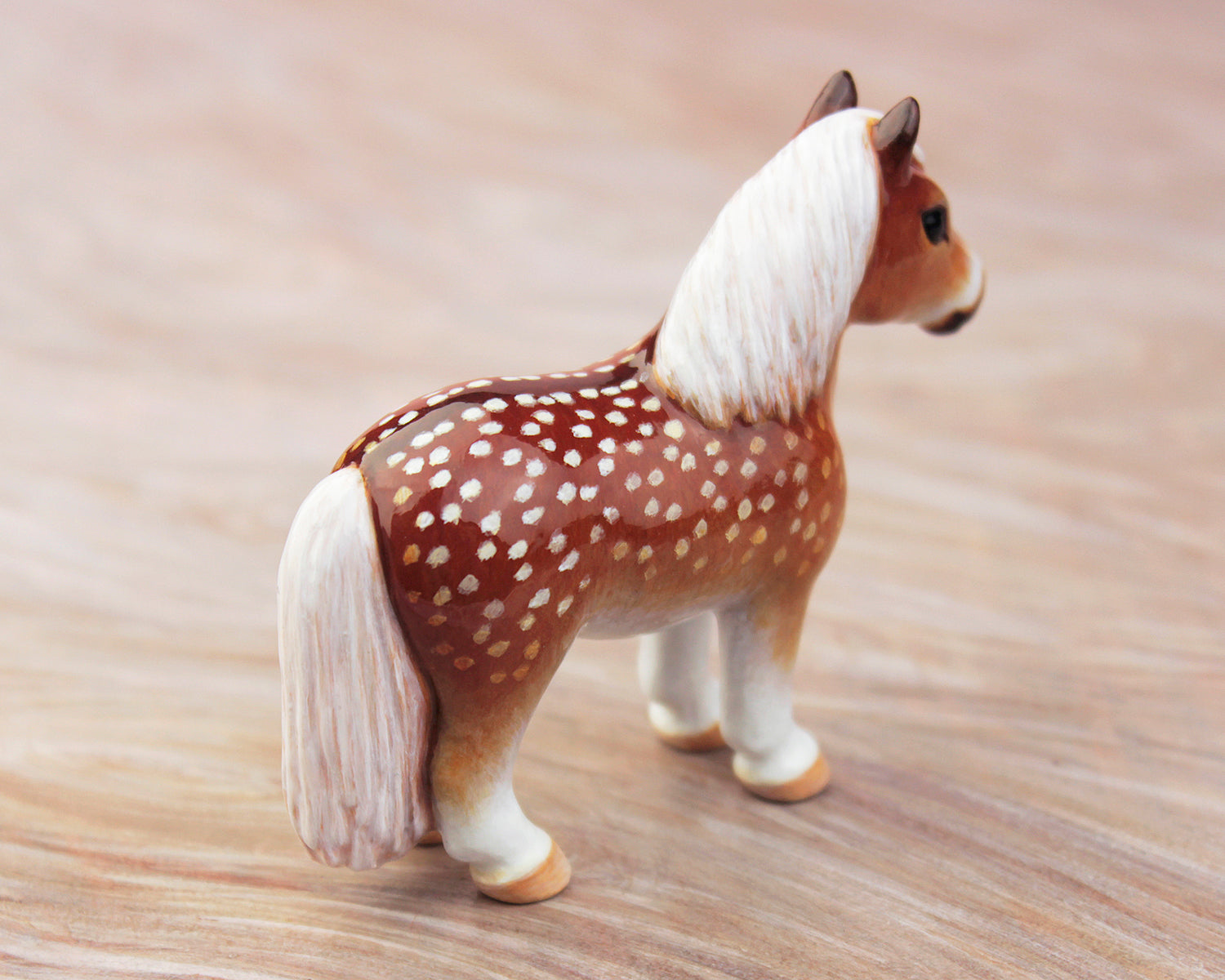fawn-spotted pony