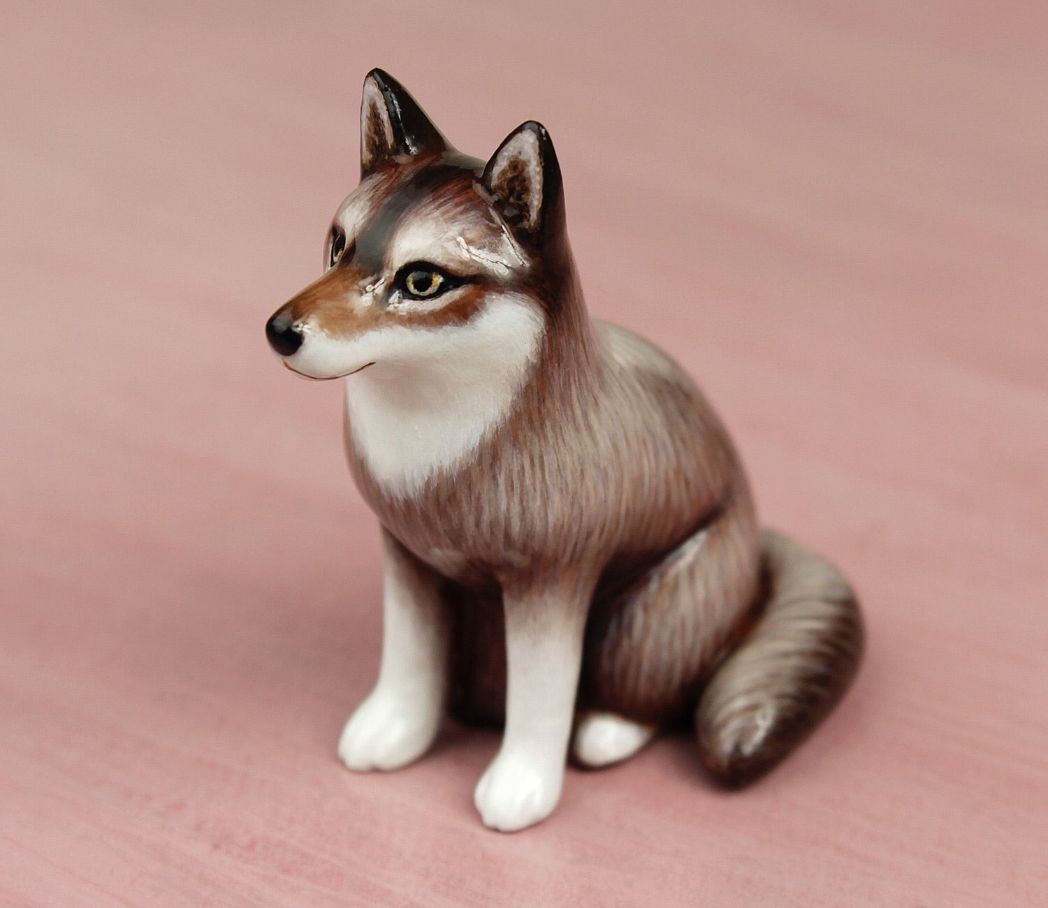 sitting wolf figurine