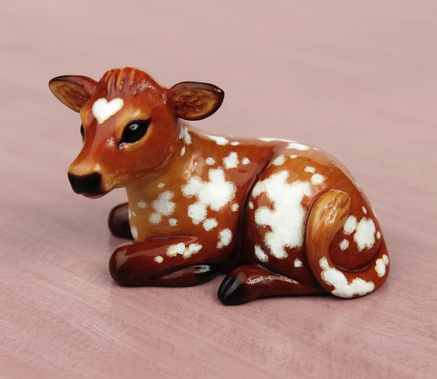 brown cow figurine