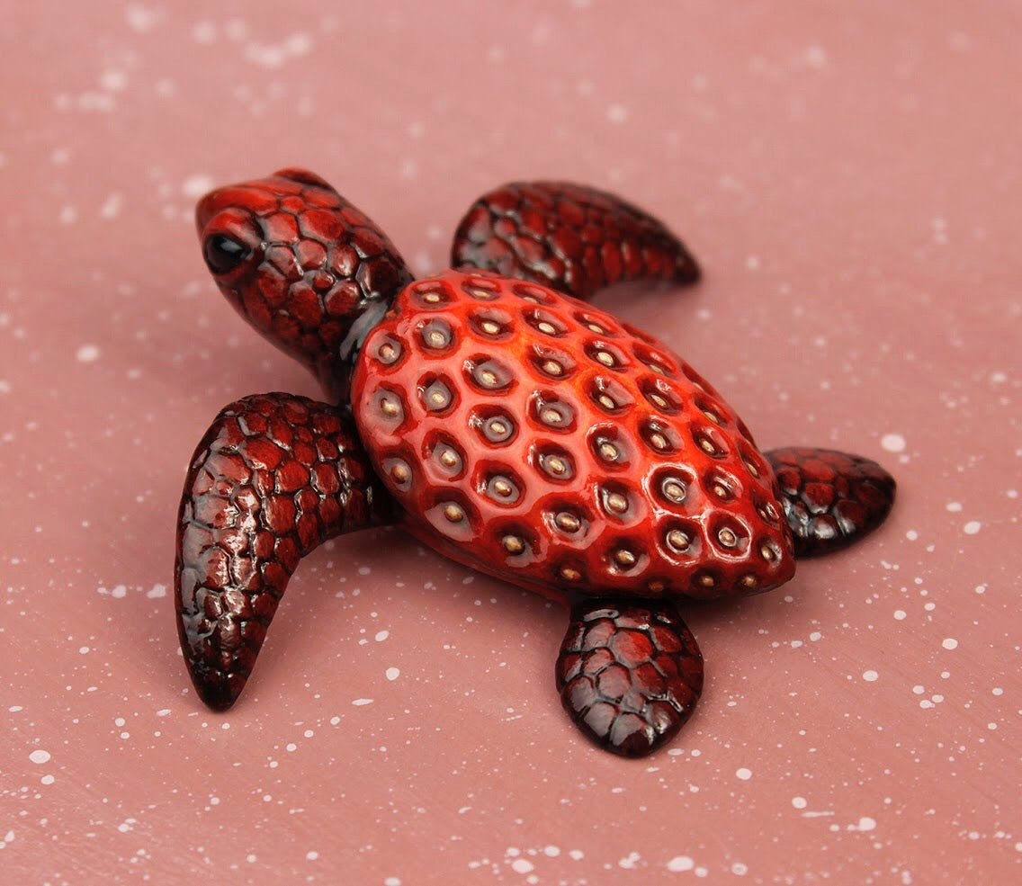 strawberry turtle figurine